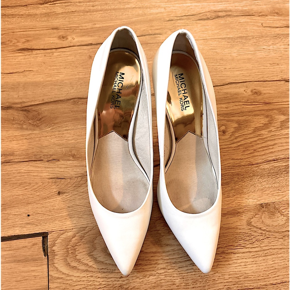 Michael Khors size 9 medium width white pointed heels .